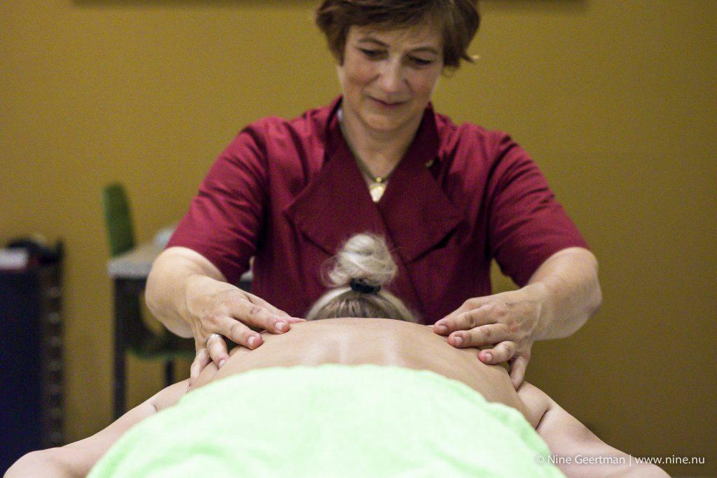 Person receiving a massage therapy.
